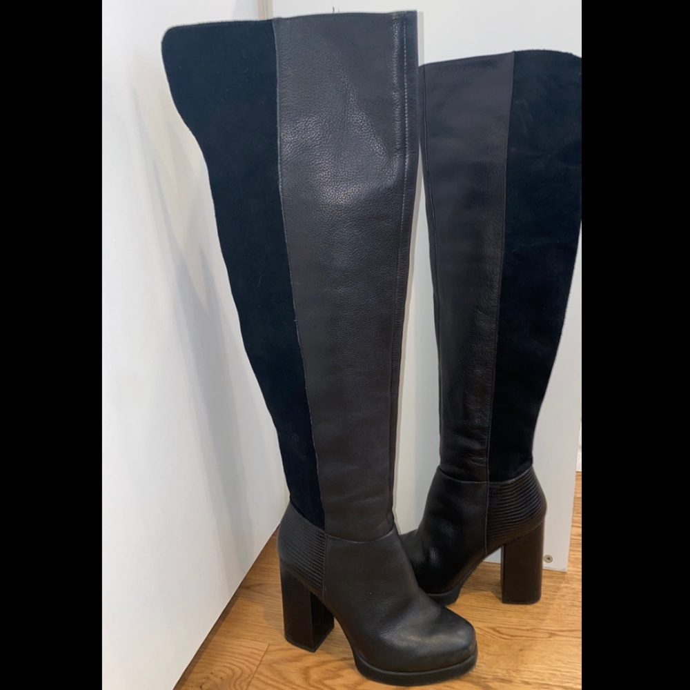 Over the knee black leather boots